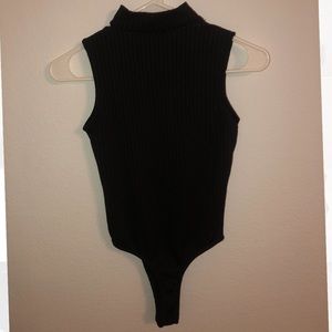 Sleek black high neck onesie
